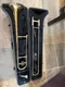 Jupiter JSL-432 Trombone with hard case and mouthpiece.